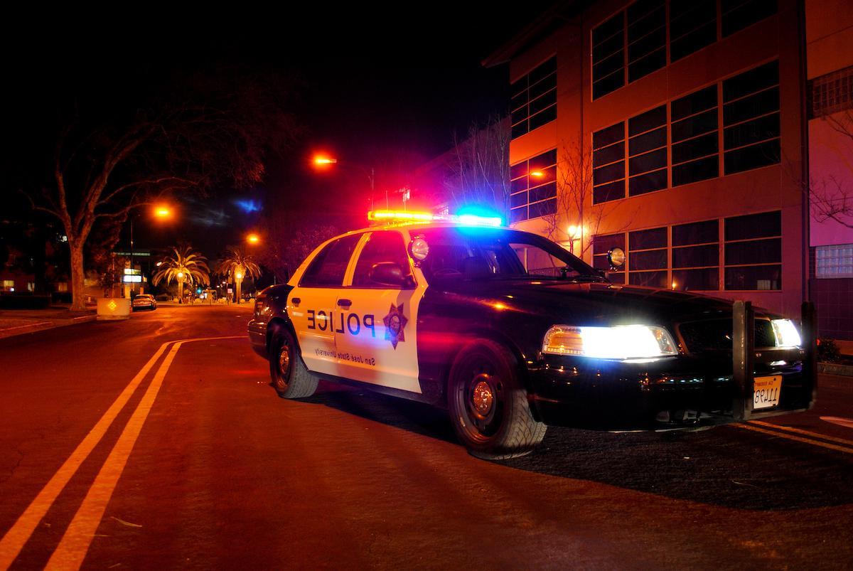 University police car with flashing lights